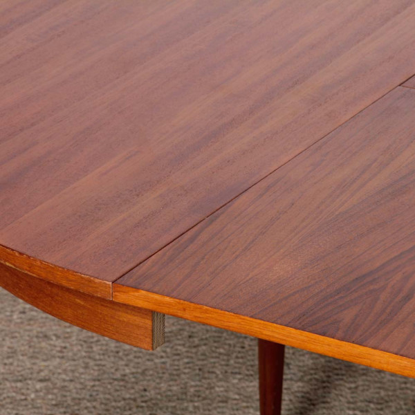 Round, extendable wooden dining table, 1960 - 