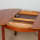 Extendable round teak dining table, 1970 - 