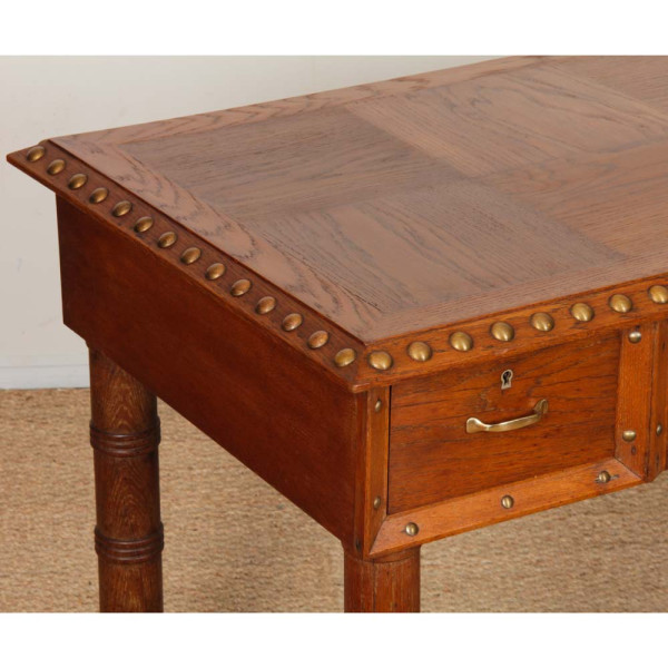Oak and brass desk in the style of Charles Dudouyt, 1940 - 