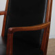 A pair of vintage wooden armchairs upholstered in imitation leather from the 1950s - 
