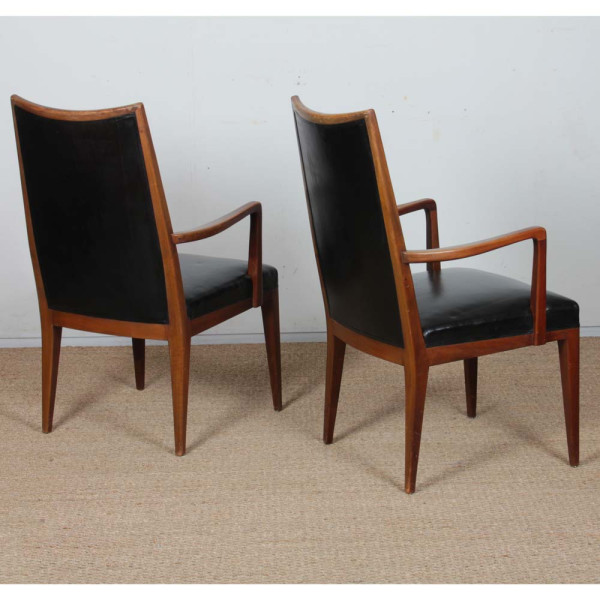 Paire de fauteuils vintage en bois et simili-cuir des années 1950 - 