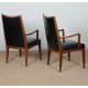 A pair of vintage wooden armchairs upholstered in imitation leather from the 1950s - 