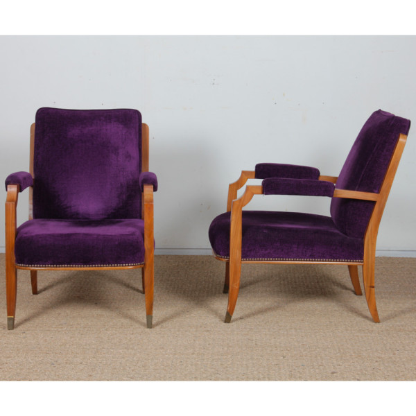 A pair of armchairs in the style of Jules Leleu, 1940 - 