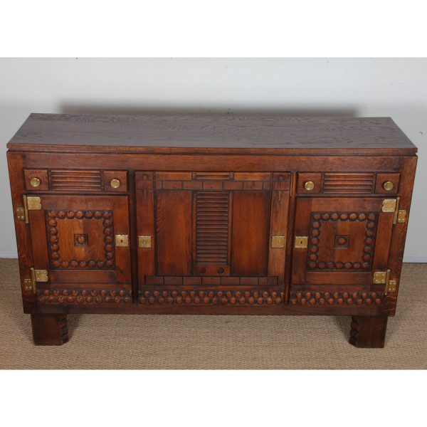 Oak and brass sideboard in the style of Charles Dudouyt, 1940 - 
